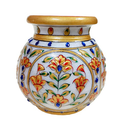A beautiful embossed marble flower vase, a perfect showpiece for a dining or living room table.