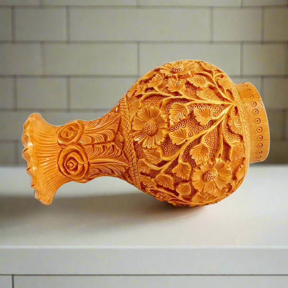 Closeup of beautiful clear floral carvings on mastercrafted flower pot.