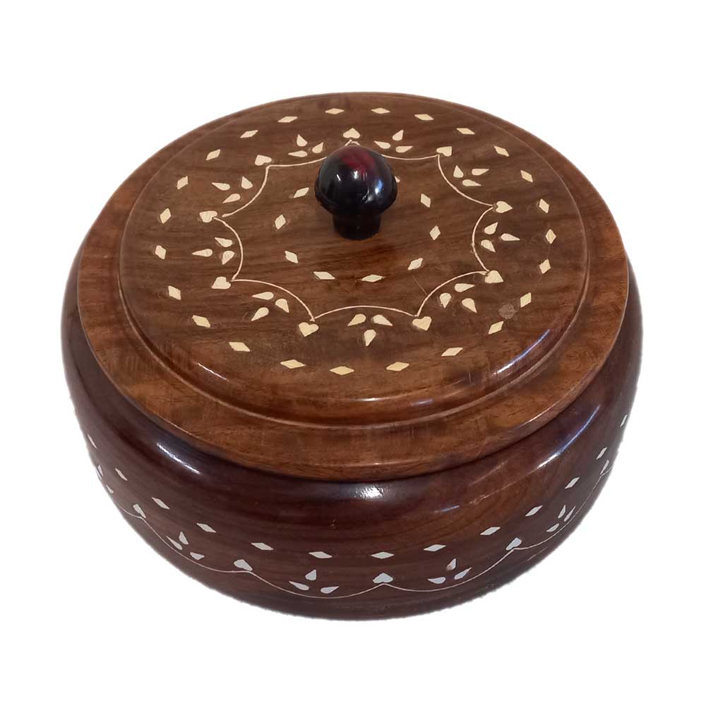 Lifestyle shot of Sisam wood spice box organizing different spices in home kitchen