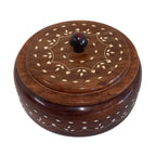 Lifestyle shot of Sisam wood spice box organizing different spices in home kitchen