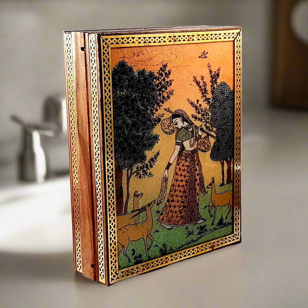 A gemstone-painted trinket box, a great gift option for women.