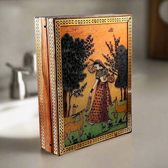 A gemstone-painted trinket box, a great gift option for women.