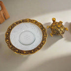 Decorative Vastu tortoise featuring glass bowl and detailed metal carving, ideal for home and office