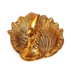 Golden oxidize polished metal duck-shaped platter to beautify the dining table for serving dry fruits.