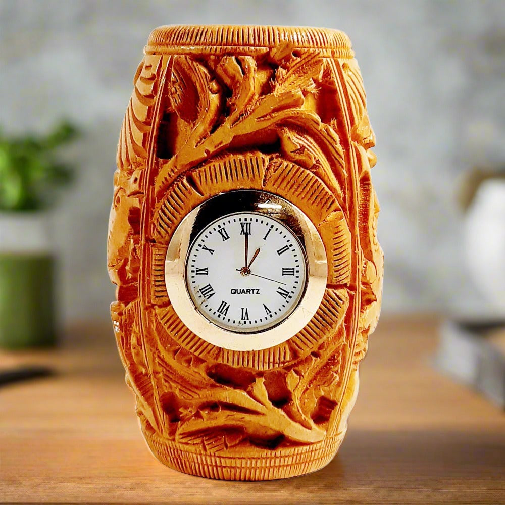 A beautifully hand-carved wooden desk organizer with a functional clock in the center.