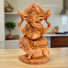A hand-carved wooden Ganesh ji idol, a great decorative piece for gifting.