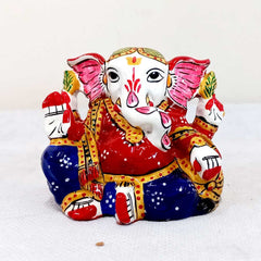 Hand-painted cute metal Ganesha idol with detailed meenakari colors, designed for car decor