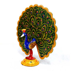 Hand-painted metal peacock idol featuring exquisite meenakari artwork and long elegant wings