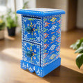 A beautiful hand-painted wooden jewelry box with two drawers for storing small jewelry.