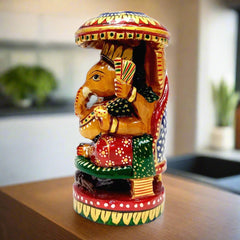 Beautifully hand-painted wooden Ganesha idol perfect for worship room, home, or car decor