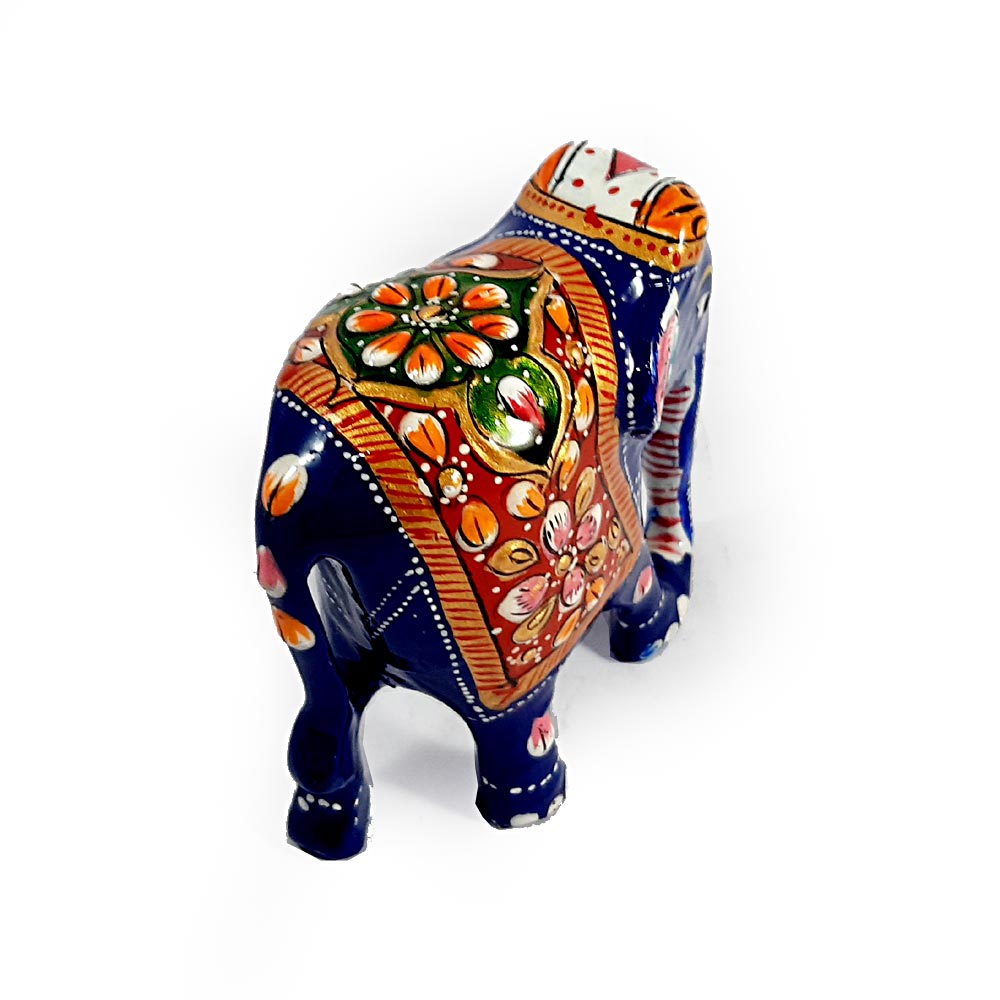 A hand-painted wooden low-trunk elephant, a beautiful showpiece for your home or office.