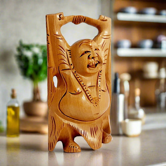 Hand-carved wooden Laughing Buddha figurine promoting positive energy for home and office display.