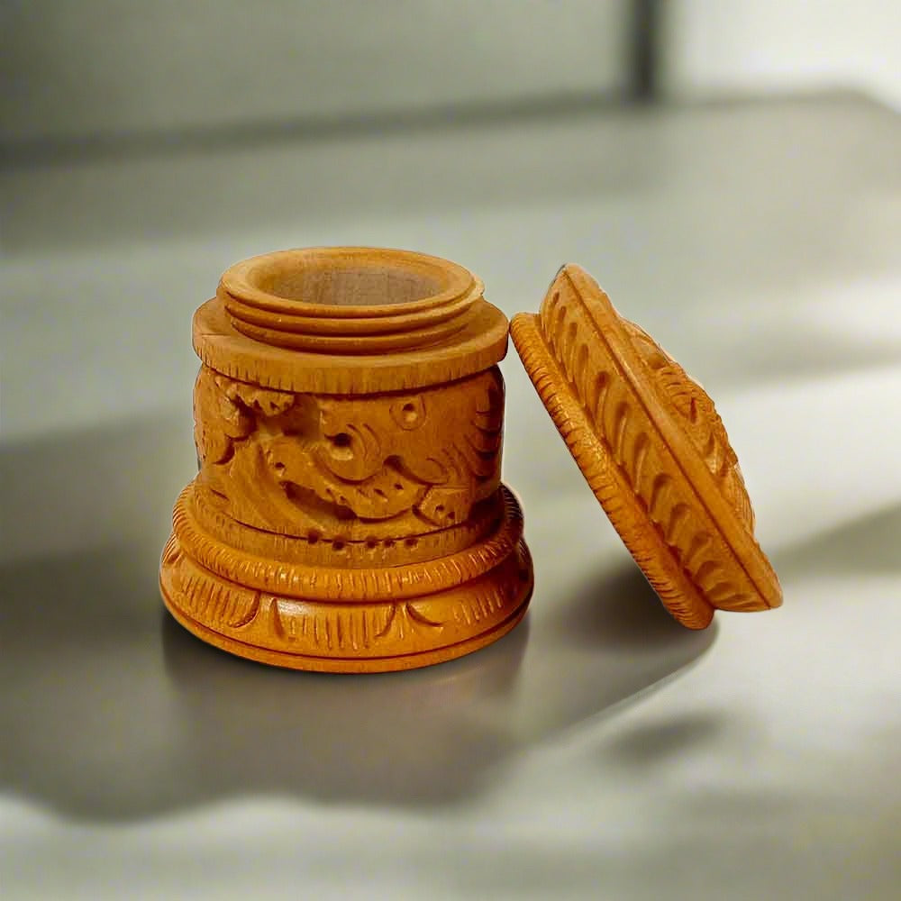 Handcrafted vermilion box made of Dani wood, finely carved for keeping Kumkum and Sindoor, perfect as a gift for women.