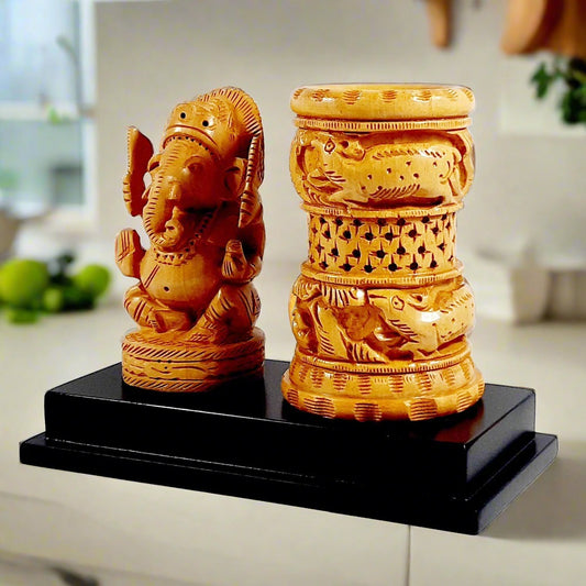 A handcrafted Lord Ganesha desk organizer that brings happiness and prosperity, a perfect gift item.