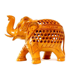 A handcrafted wooden elephant carving, a beautiful and lucky gift.