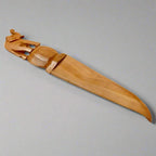 Handcrafted wooden paper cutter with a detailed elephant design carved on the handle for office use.