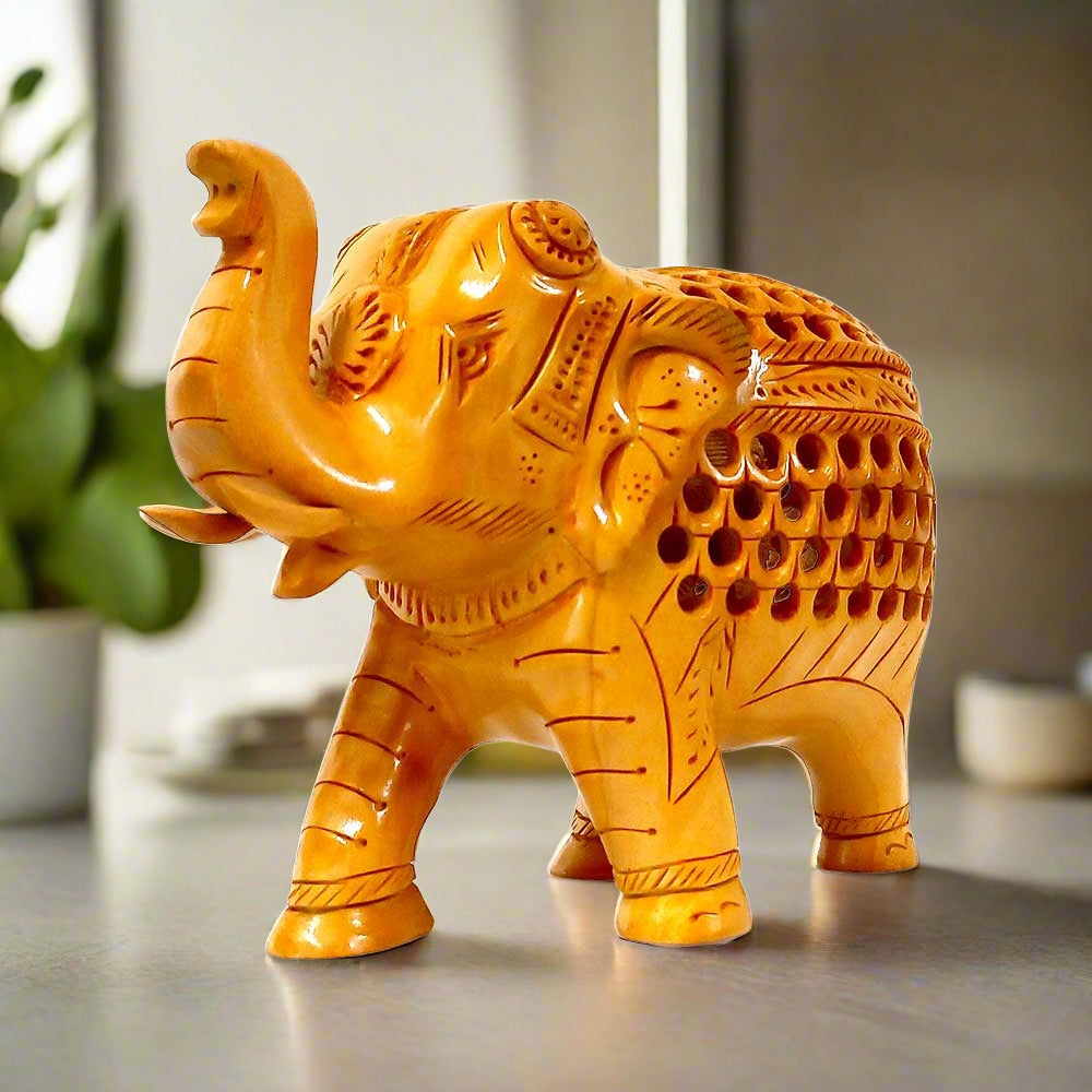 A handcrafted wooden forged elephant, a beautiful piece for home decor and gifting.