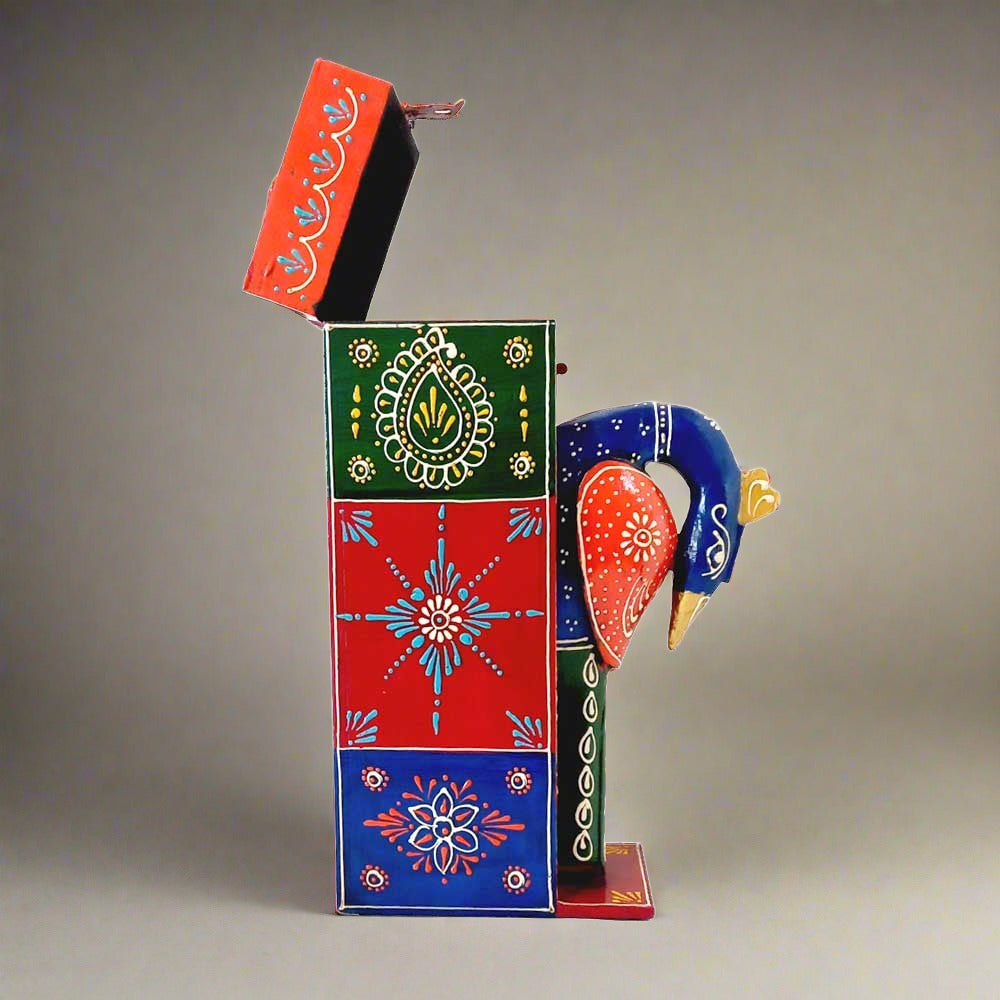 A handcrafted wooden peacock bottle holder with stunning multi-colored emboss painting.