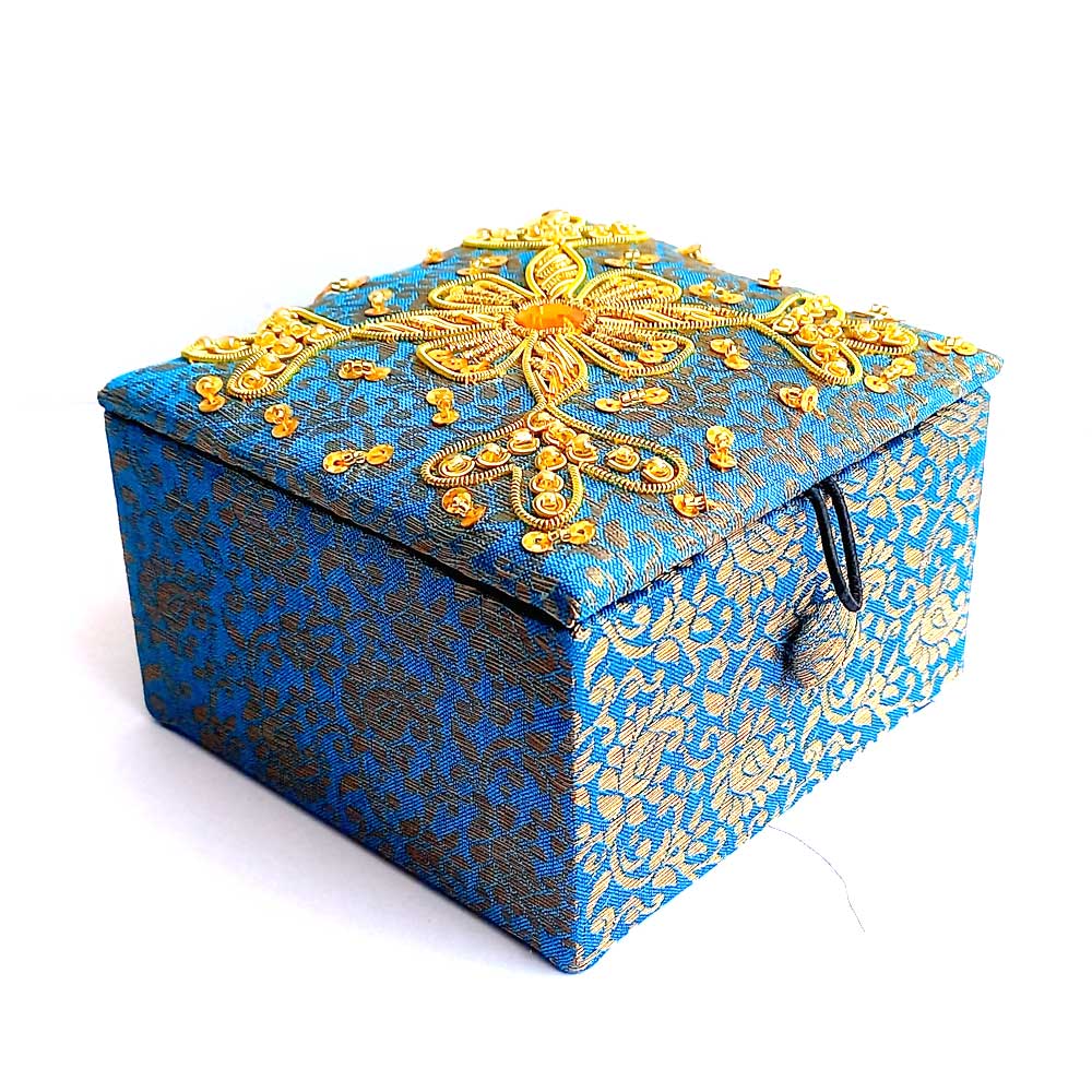 Handcrafted small silk jewelry box featuring traditional zardosi embroidery with golden wire and sequins.