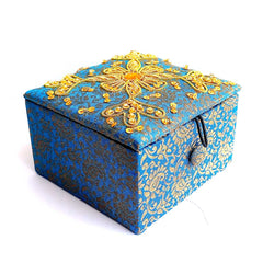 Handcrafted small silk jewelry box featuring traditional zardosi embroidery with golden wire and sequins.