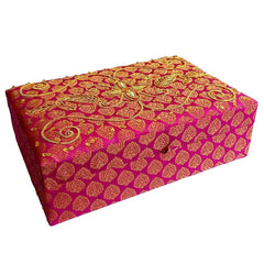 A handmade fabric storage box with zardosi art, a perfect gift for personal use or a wedding.