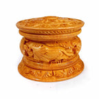 A handmade Kadamba wood box that is perfect for keeping both powder and jewellery.