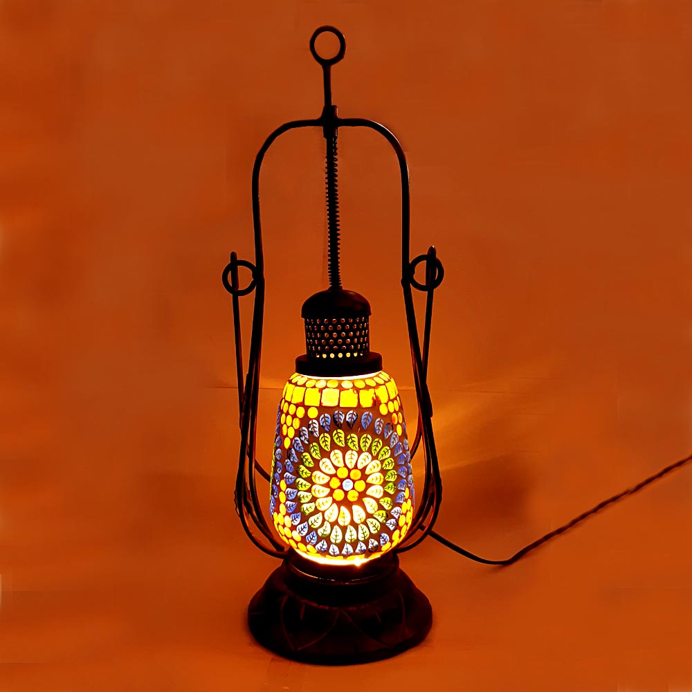 Handmade lantern-shaped lamp made of glass, metal, and wood with intricate mosaic work and crystal decorations.
