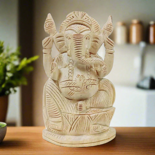 A beautiful handmade Ganesh statue crafted from Saven wood, bringing happiness and peace to your home and office.
