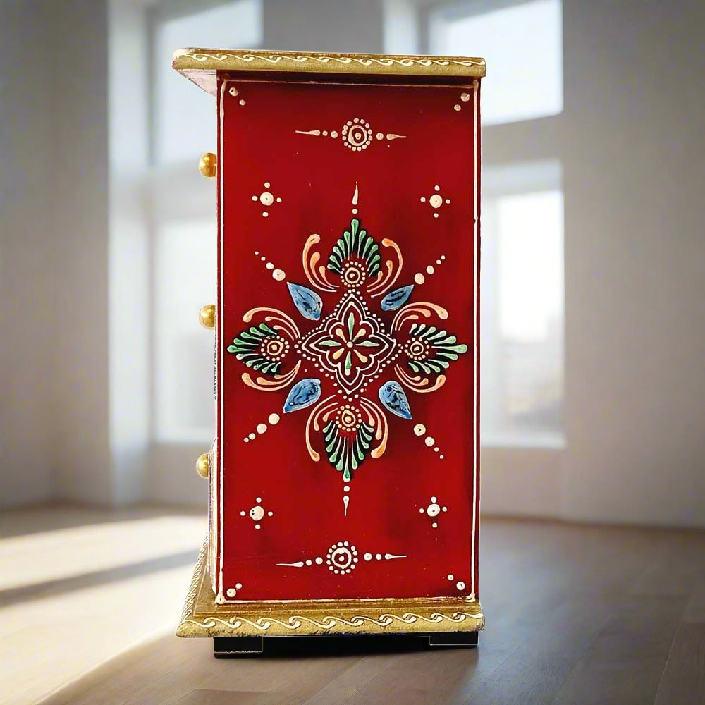 A beautiful handmade wooden trinket box with commendable embossed painting.