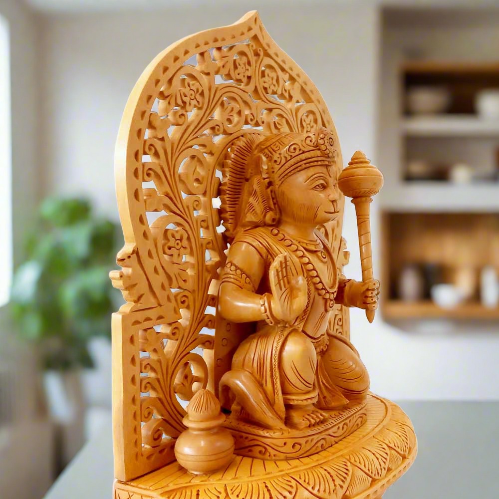 Intricately crafted Hanuman ji idol with fine carvings on crown, garland, dress, mace, and arch backdrop