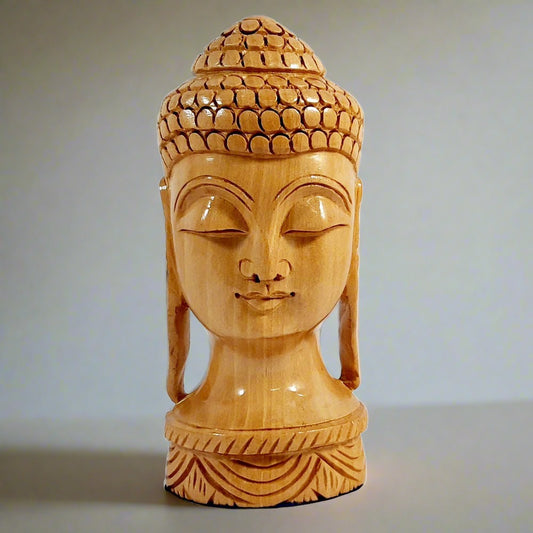 A high-quality Buddha head statue made from dried wood, symbolizing wisdom and enlightenment.
