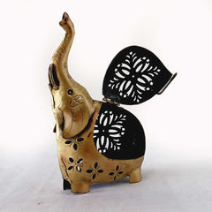 A high-trunked elephant candle stand with a beautiful lattice design on its body.