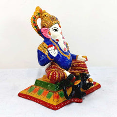 Metal Ganesha idol on chowki with meenakari painting, detailed rat and laddoos, perfect for home and car decoration