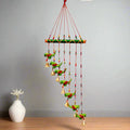 Interior decor papermache parrot toran featuring vivid green parrots and golden bell embellishments, handmade.