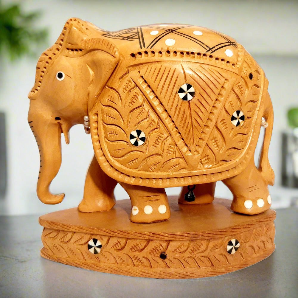 Handcrafted Kadamb wood inlay elephant idol downward trunk front view.