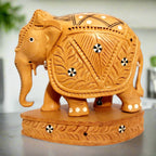 Handcrafted Kadamb wood inlay elephant idol downward trunk front view.