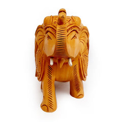 Beautifully carved Kadamba wood elephant figurine with fine handmade detailing.