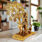 Exquisite metal Lord Krishna statue with cow, peacock & tree – perfect home altar display.