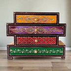 A beautiful, hand-painted wooden 4-drawer box by KKGiftStore with an embossed antique look.