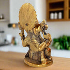 Sitting Ganesh metal murti with anti-tarnish brass finish – invites prosperity & positive energy.