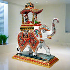 Large metal Ambabari elephant adorned with detailed meenakari hand painting, perfect for royal wedding decor and living spaces.