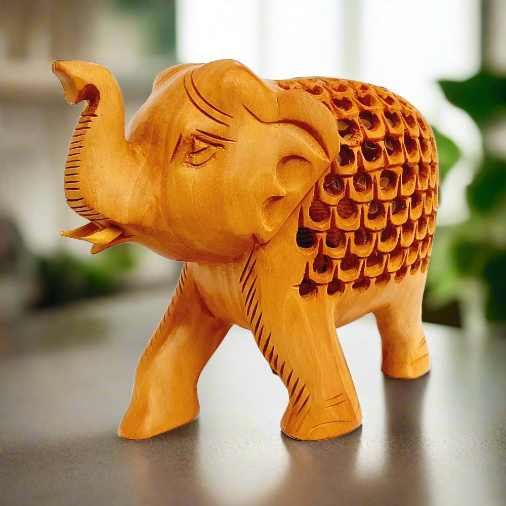 Closeup of fine lattice jali carving on traditional Jaipur wooden elephant handicraft
