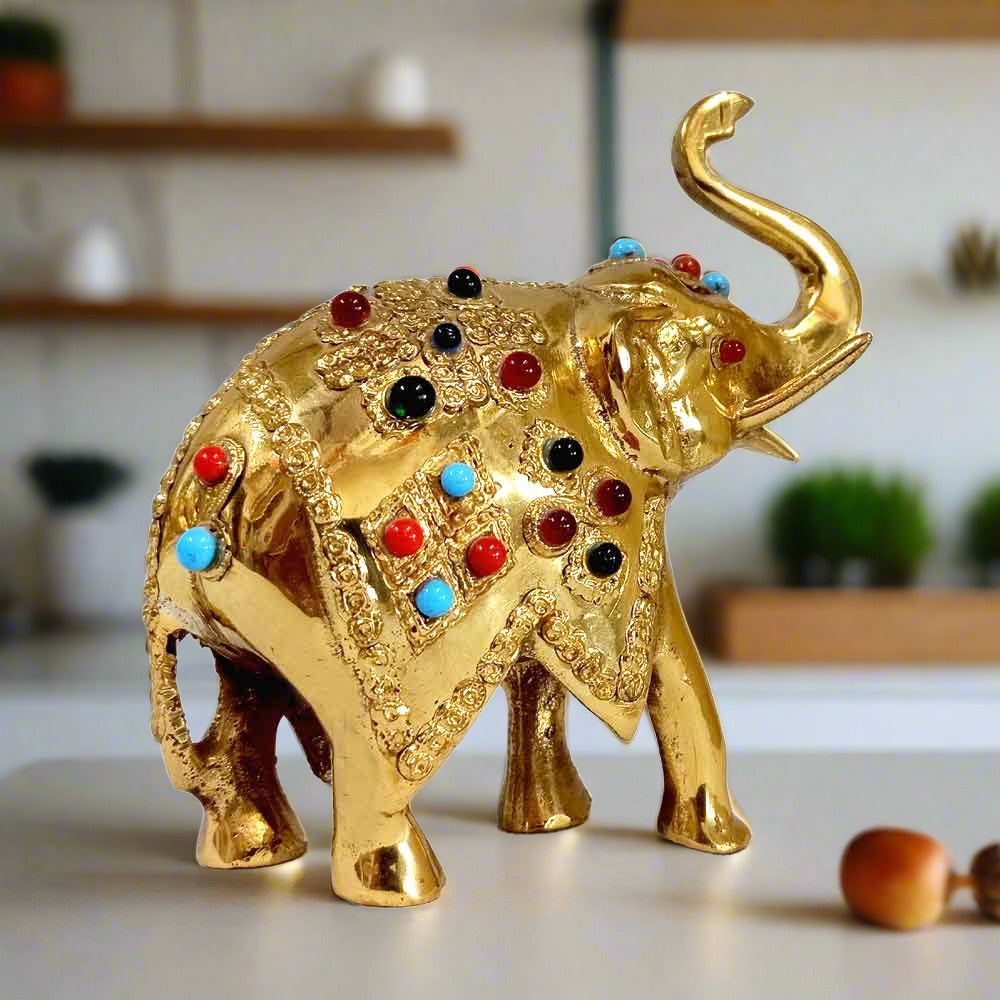 Side angle of 12cm handcrafted brass lucky elephant with trunk up, traditional Jaipur handicraft showpiece.
