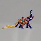 A lucky elephant key ring with beautiful Meenakari hand painting, an ideal gift for return gifts.