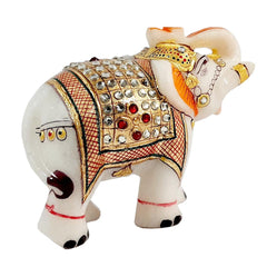 Back showing white red kundan embellishments on solid marble elephant.