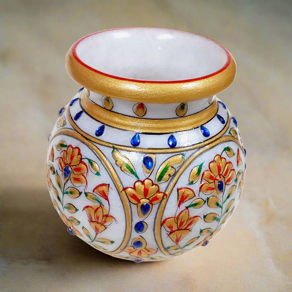 A round marble Gangajal pot with colorful emboss painting, a great gift item for worship.