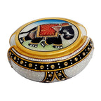 Handcrafted marble coasters featuring detailed elephant motifs and embellished holder, perfect for gifts