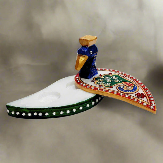 A marble kumkum chopra decorated with kundan, a perfect return gift for pooja or wedding ceremonies and festival.