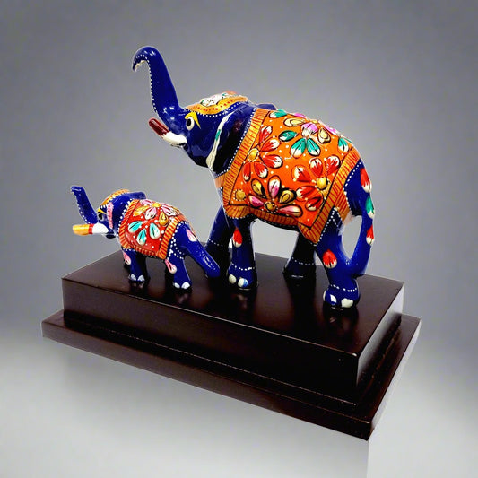 Meenakari hand-painted elephant mother and baby figurine on wooden base.