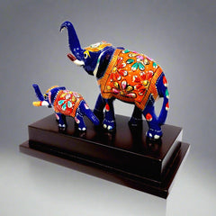 Meenakari hand-painted elephant mother and baby figurine on wooden base.